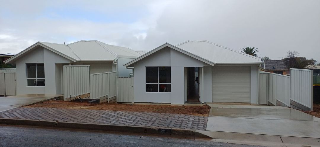 Two completed homes on a subdivided block in Ingle Farm